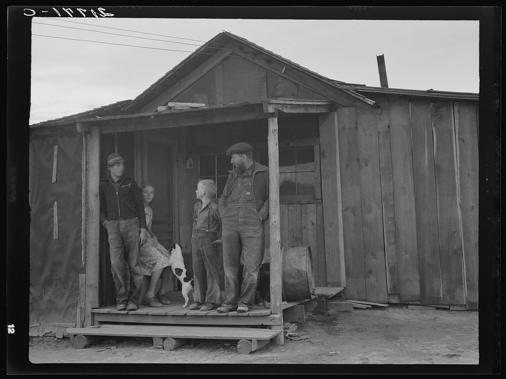 Stump farm family and their present home. Boundary County, Idaho. See general caption 52. Sourced from the Library of…