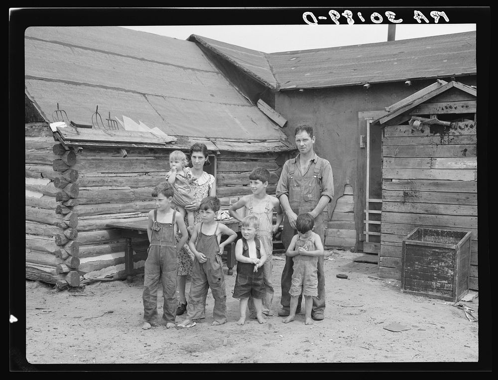 Art Simplot and family in front of their house near Black River Falls, Wisconsin by Russell Lee
