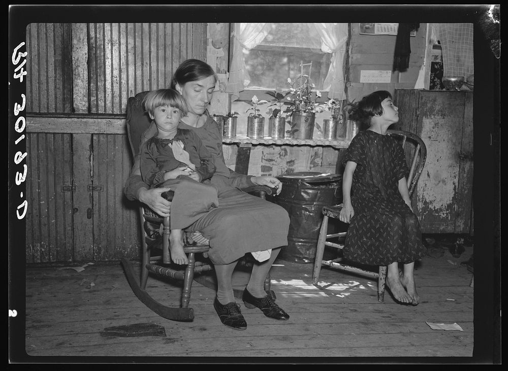 Wife and children of John Mathews. Near Black River Falls, Wisconsin by Russell Lee