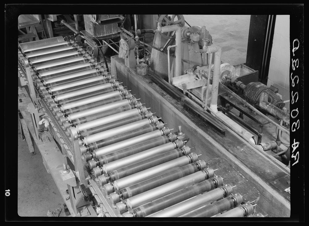 Fourdinier rolls on paper machine. Forest Products laboratory, Madison, Wisconsin by Russell Lee