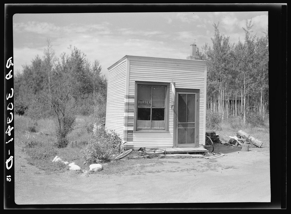 Barber shop in village of Twig, Minnesota by Russell Lee