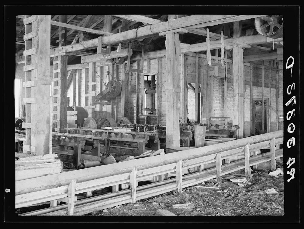[Untitled photo, possibly related to: Machinery in abadoned excelsior mill. Ericsburg, Minnesota] by Russell Lee