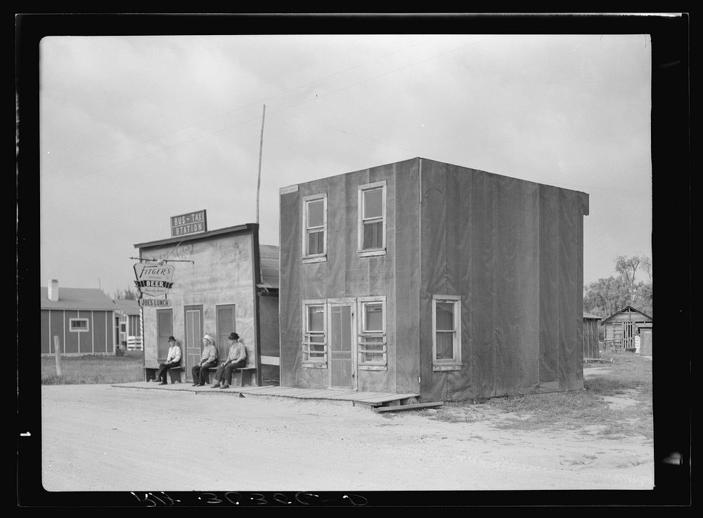 Buildings, beer parlor and tar paper dwelling. Craigville, Minnesota by Russell Lee