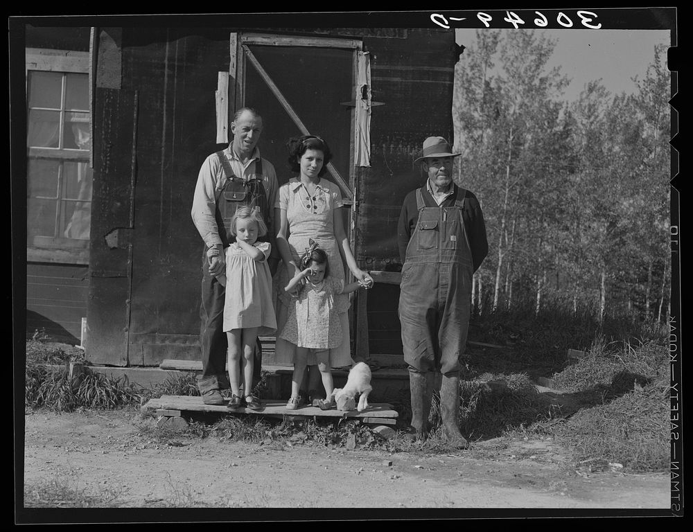 Orville White, his wife, children and father. Mr. White is a farmer of the cut-over lands near Northome, Minnesota by…
