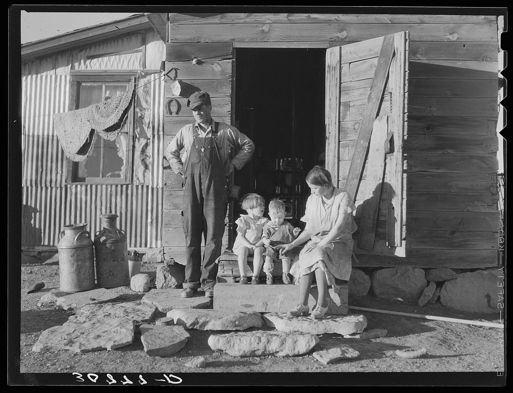 A farmer and his family in front of home. Williams County, North Dakota by Russell Lee