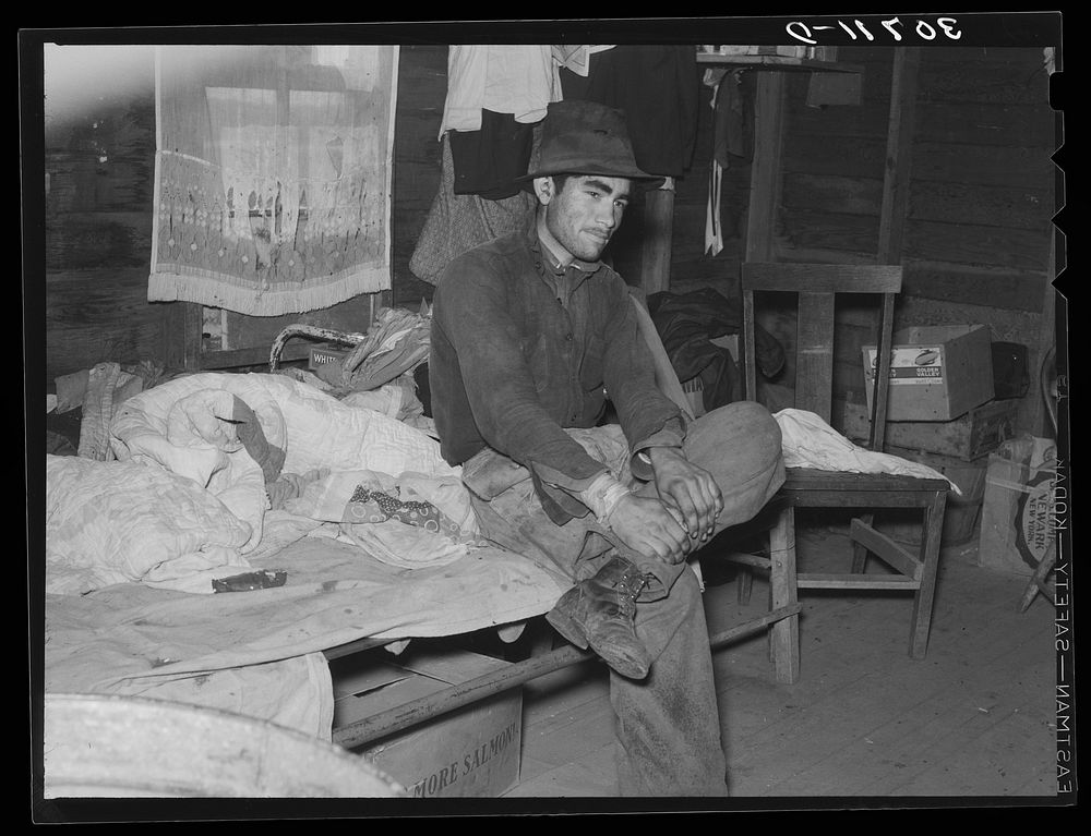 Mexican beet worker in his shack near East Grand Forks, Minnesota by Russell Lee