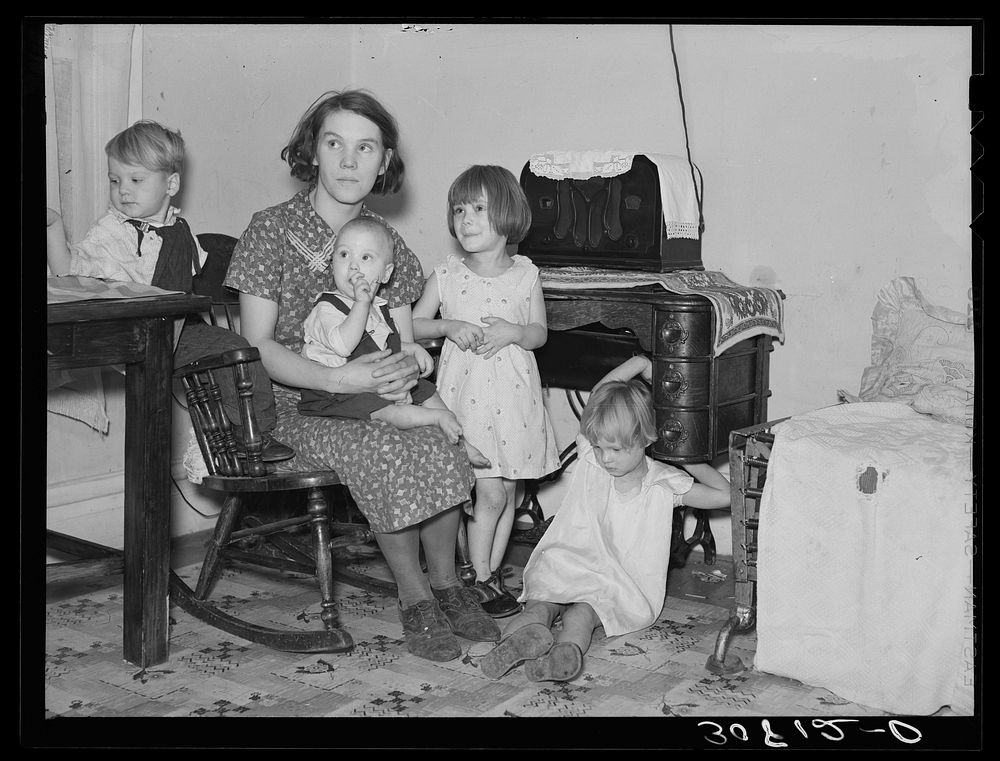 Mrs. Shotbang with her four children she delivered herself. Husband broke his foot early this spring. About time baby was to…