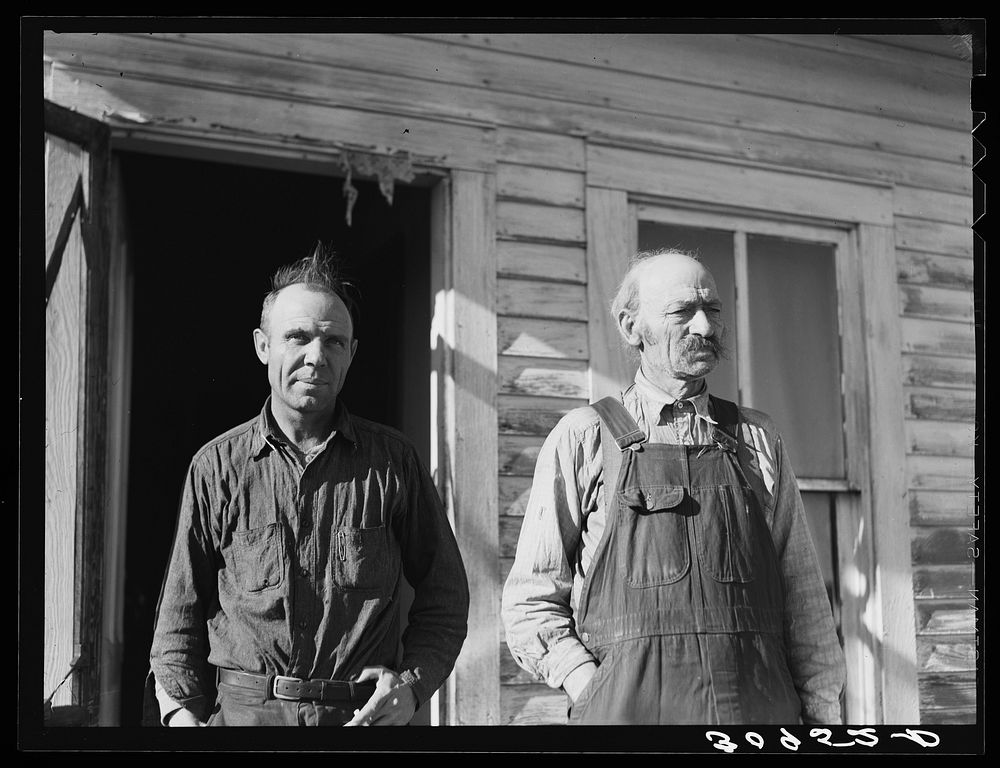Father and son. Bertelson family, Antelope, Montana by Russell Lee