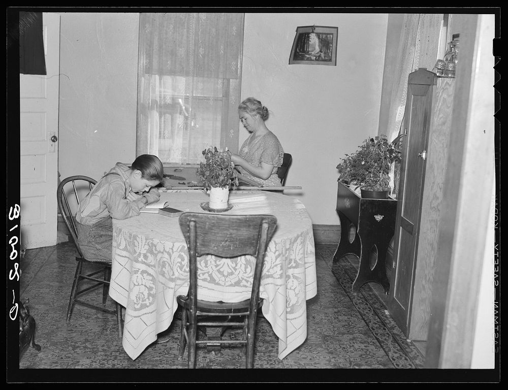 Dining room in the Jorgenson farm home. Divide County, North Dakota by Russell Lee
