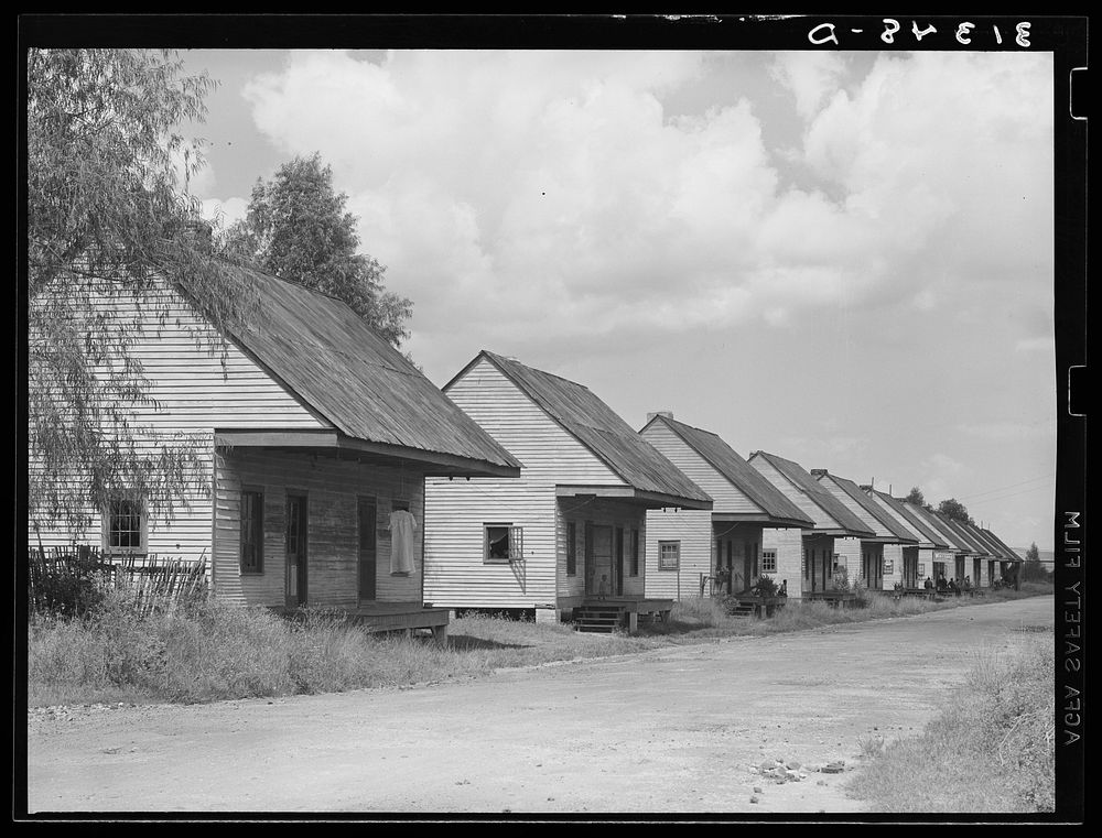 Row of cabins, Destrehan, Louisiana by Russell Lee
