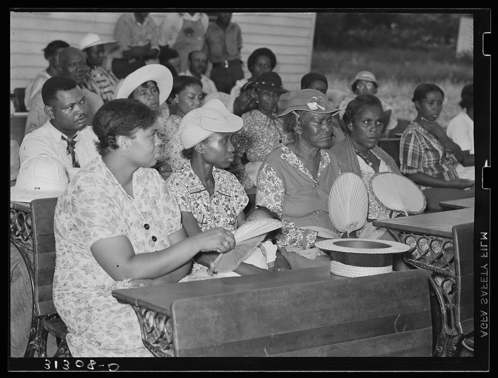 Group of African Americans assembled for meeting to receive advice concerning public health. Southeast Missouri Farms by…