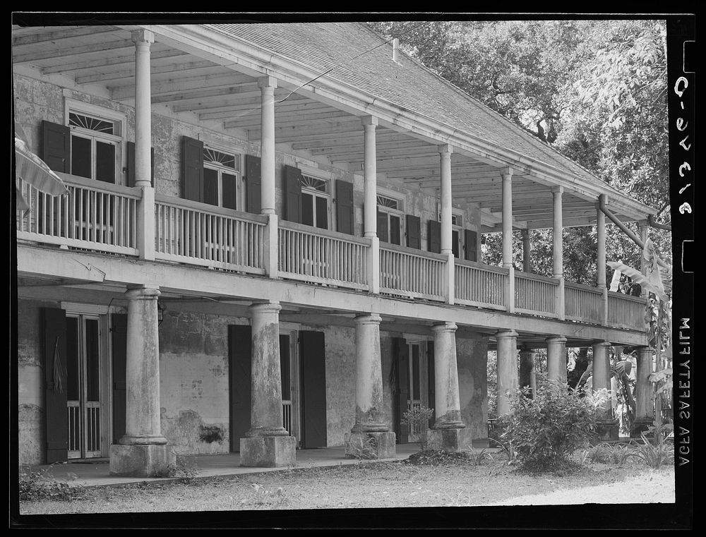 Balcony and verandah of old plantation house near New Orleans, Louisiana by Russell Lee