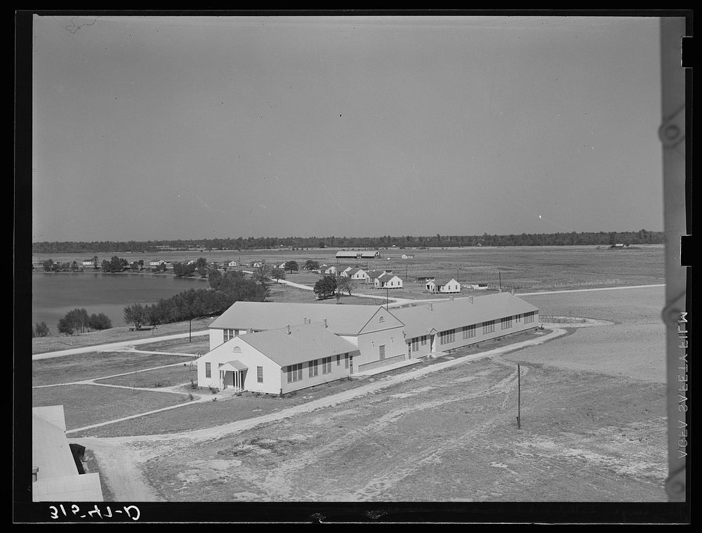 Panoramic view of Lake Dick Project. Community center in foreground. Lake Dick, Arkansas by Russell Lee