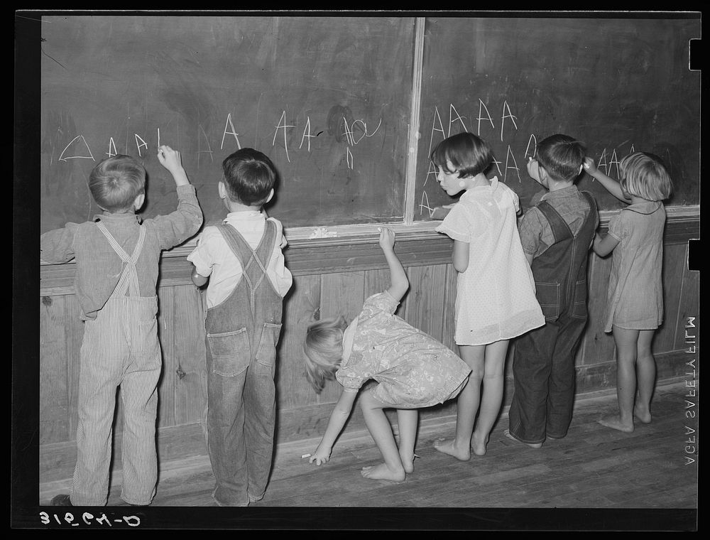 Children at the board. Lake Dick Project, Arkansas by Russell Lee