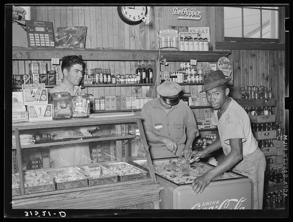 Icing soft drink refrigerator in general store. Lake Dick Project, Arkansas by Russell Lee