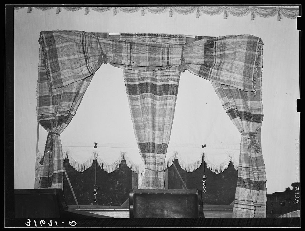 Homespun draperies in home of Madame Dronet. Erath, Louisiana by Russell Lee