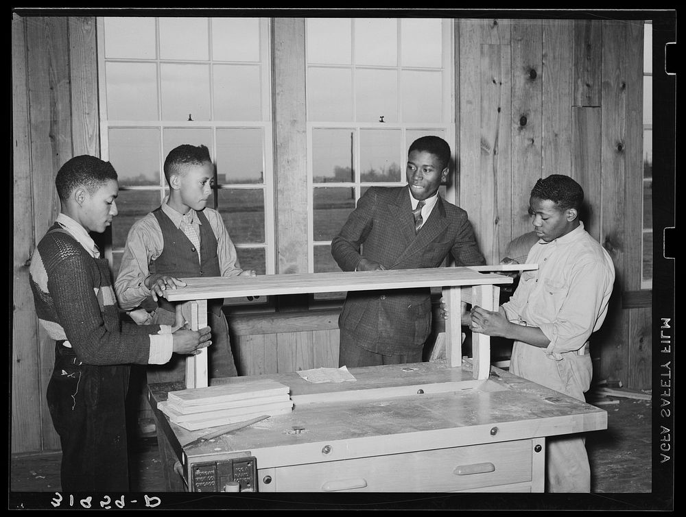 Assembling bench in manual training room at Lakeview Project school. Arkansas by Russell Lee