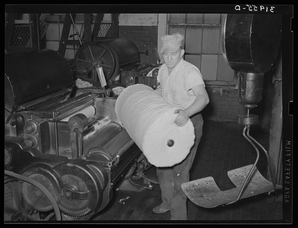 Operator removing bat cotton machine. | Free Photo - rawpixel