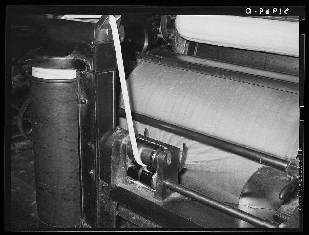 Detail of process of making cotton ropes from cotton bats. Laurel mills, Mississippi by Russell Lee