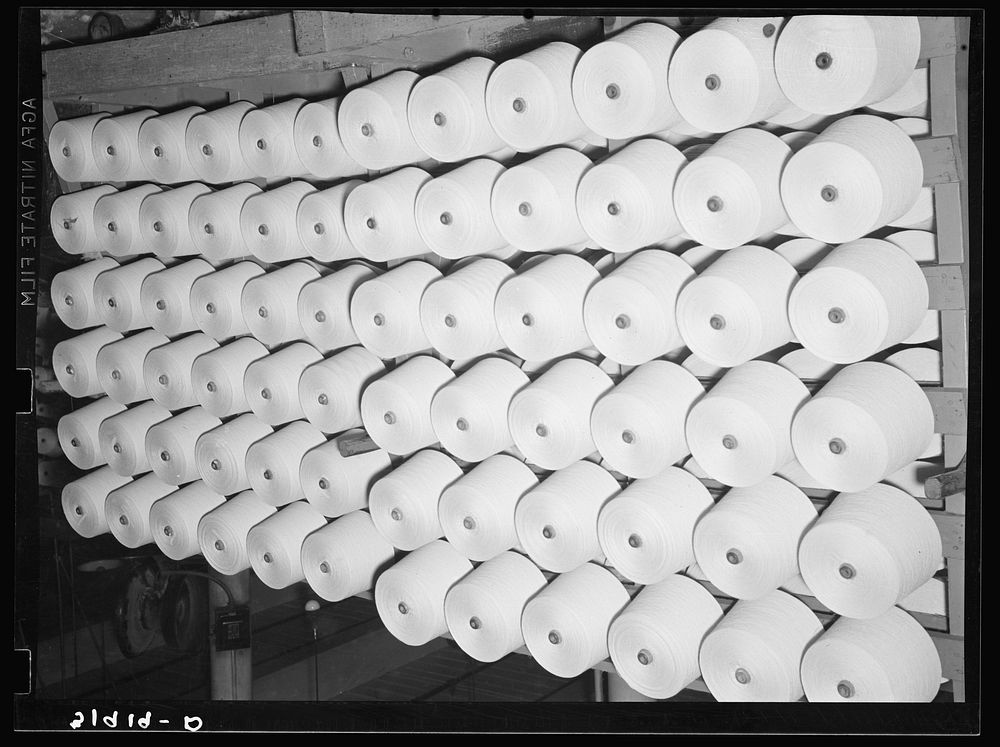 Spools of cotton thread. Laurel mill, Laurel, Mississippi by Russell Lee