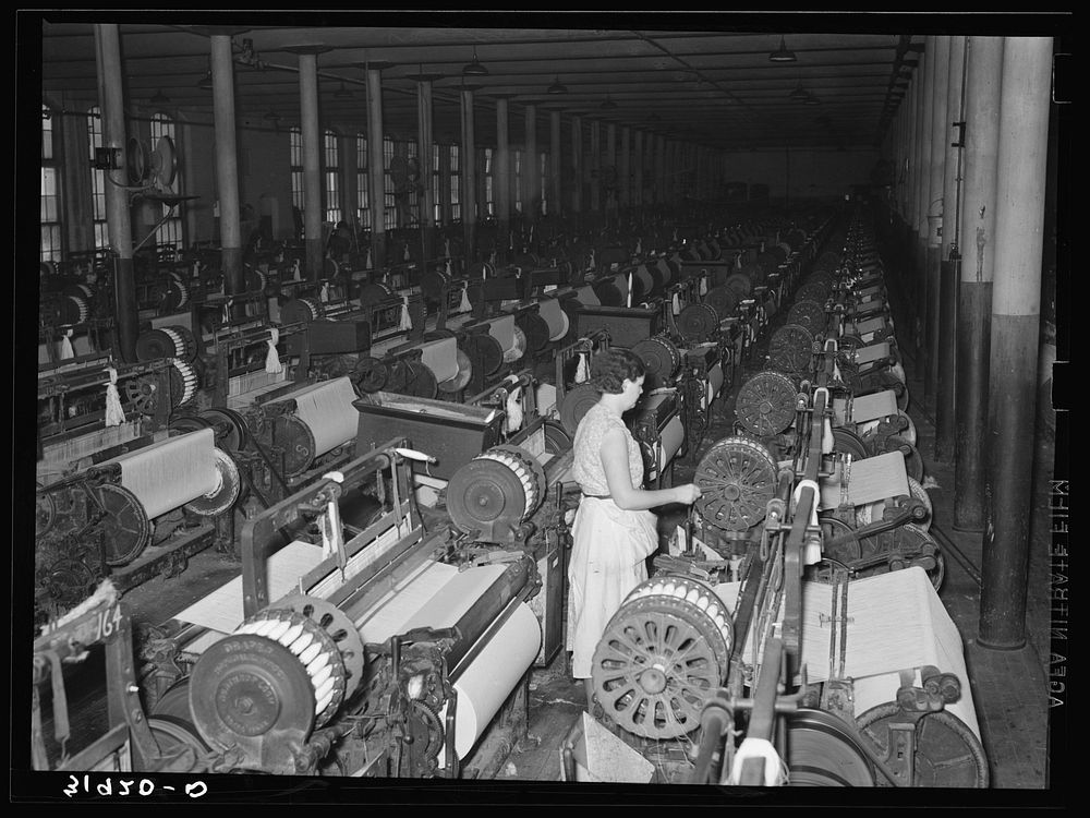 Weaving room, Laurel cotton mill. Laurel, Mississippi by Russell Lee