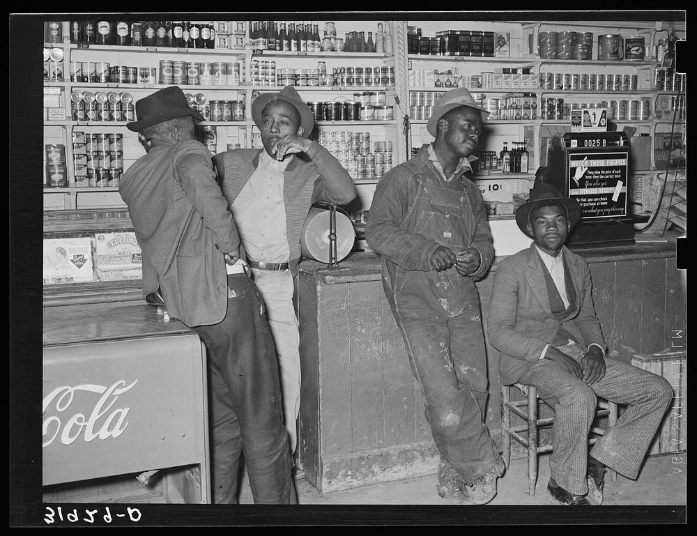 Men in cooperative general store. Transylvania, Louisiana by Russell Lee
