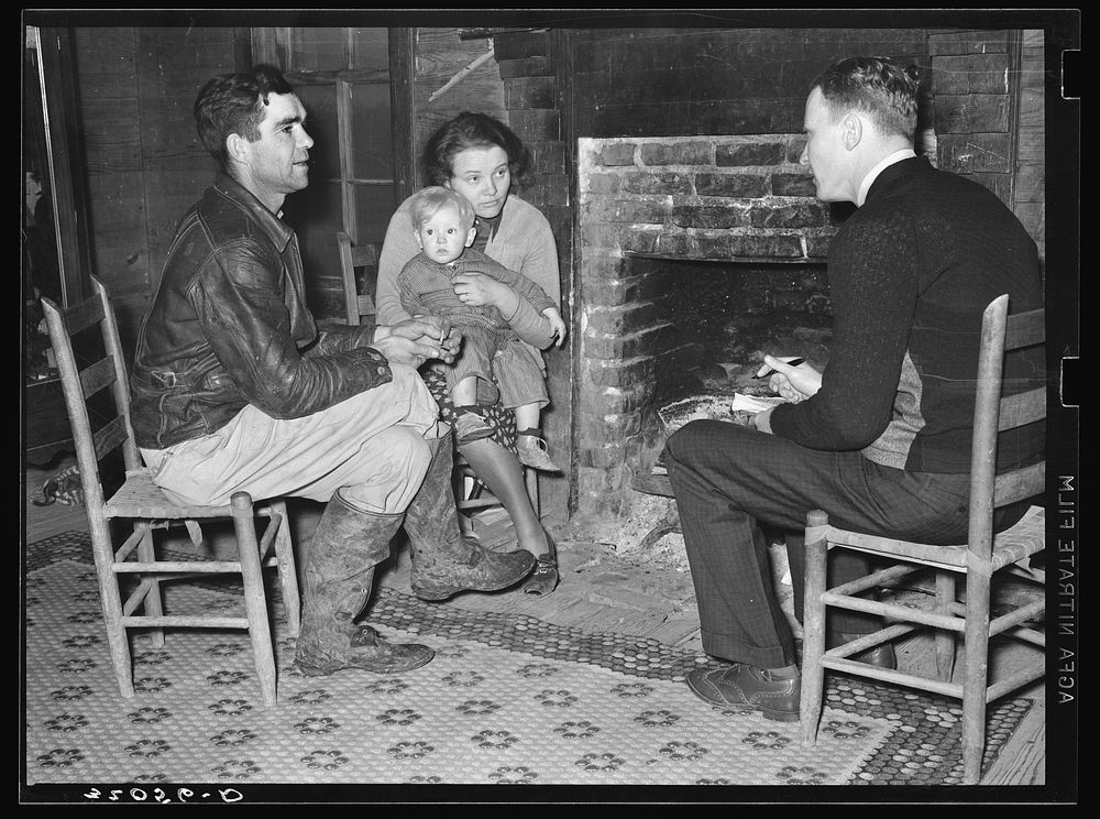 Tenant farmer being interviewed by FSA (Farm Security Administration) Family Section agent, near Pace, Mississippi.…