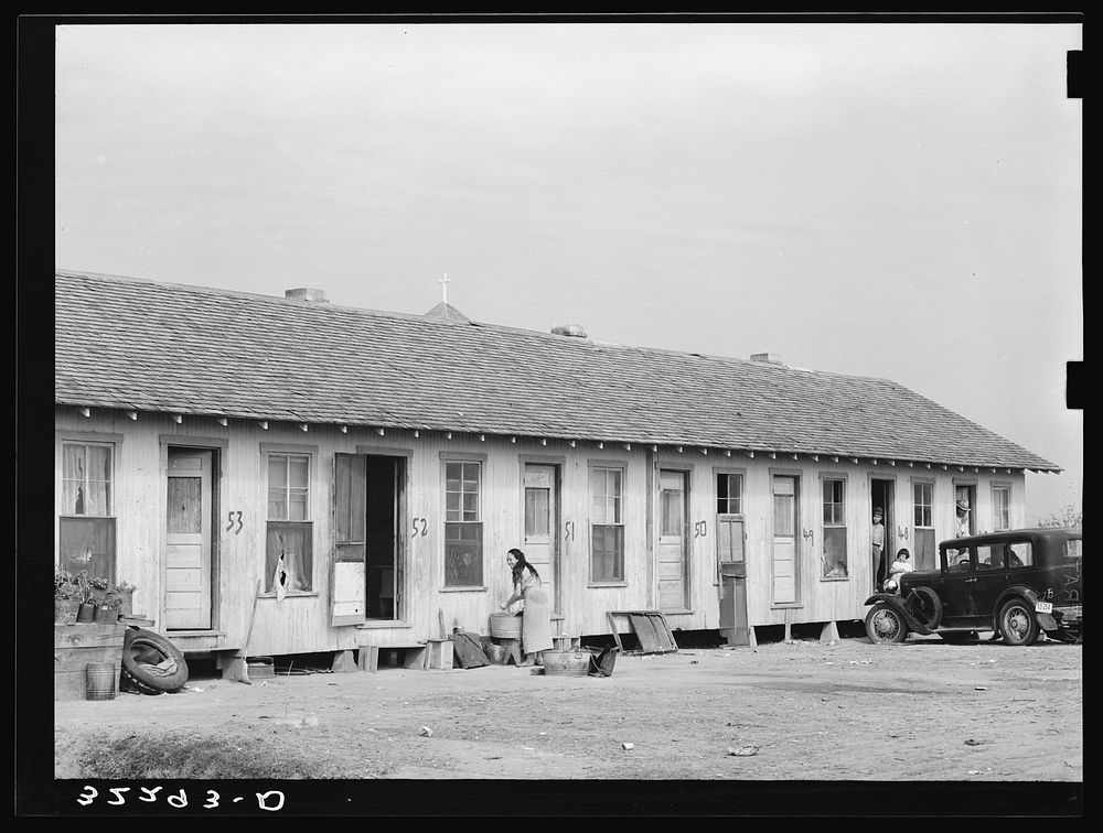 Mexican migrant housing. Edcouch, Texas. These units are owned by a labor contractor who rents them for a nominal sum to his…