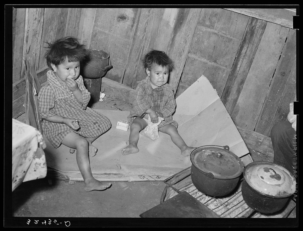 Mexican children in kitchen. San Antonio, Texas by Russell Lee