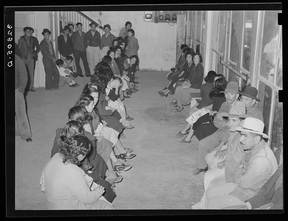 Mexican pecan workers waiting in union hall for assignment to work. San Antonio, Texas by Russell Lee