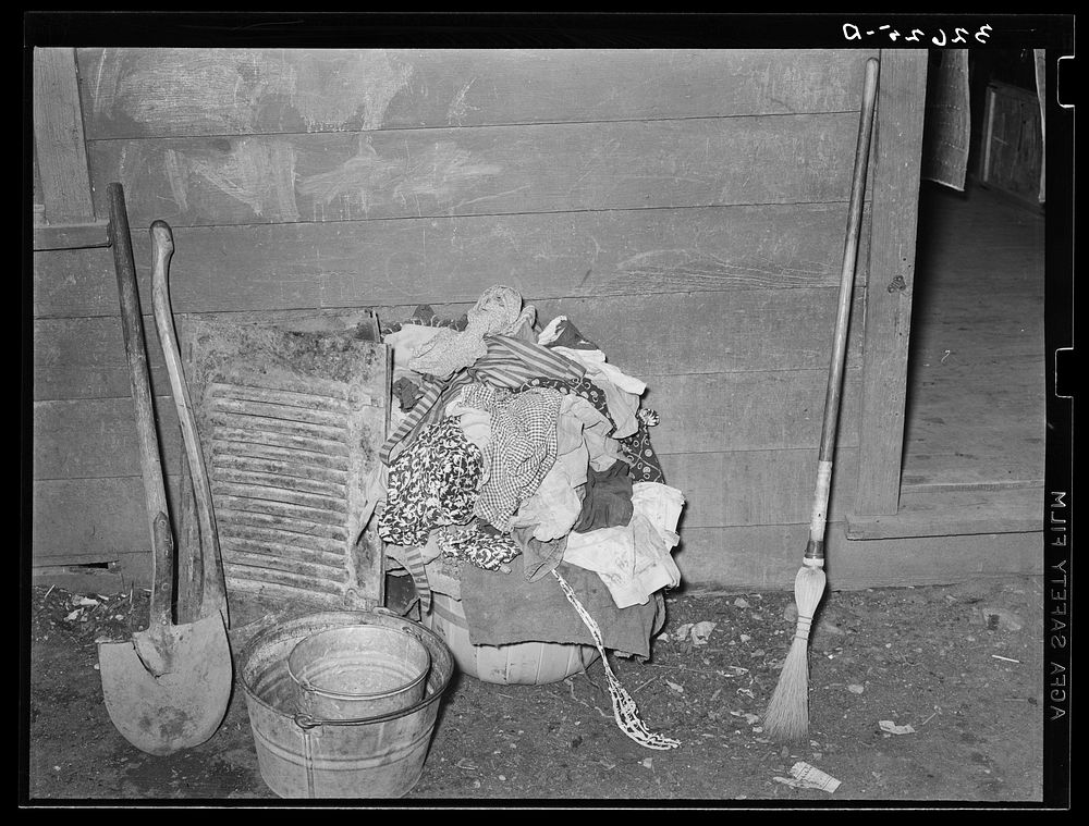 Laundry and household and garden tools. Mexican section, San Antonio, Texas by Russell Lee