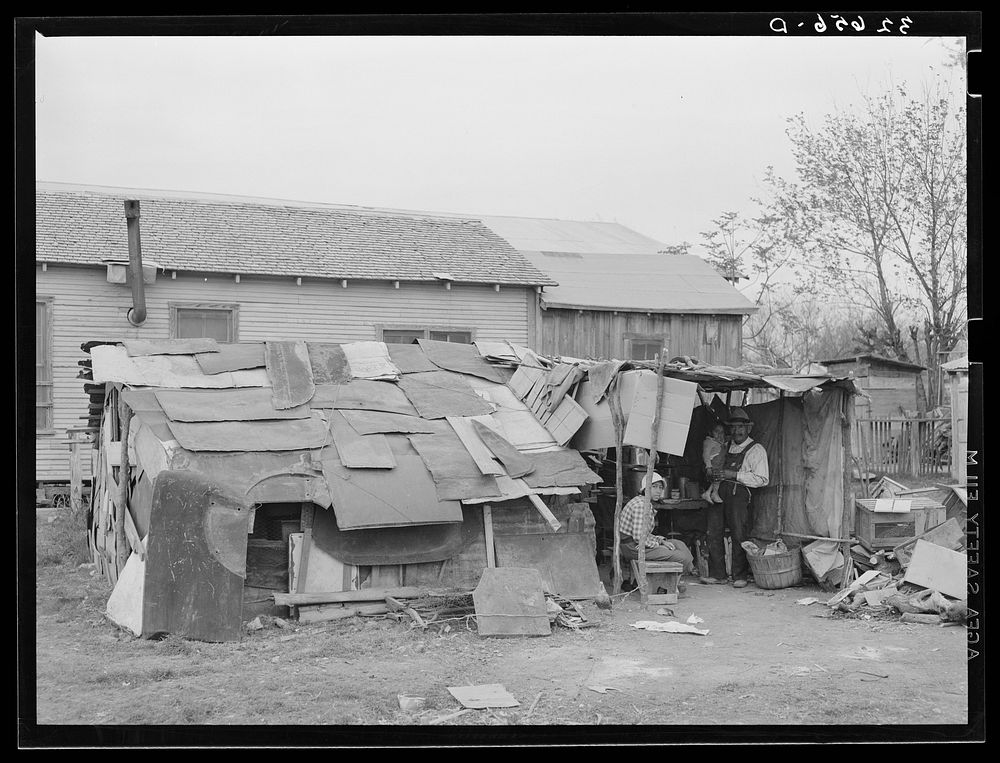 Squatters in Mexican section in San Antonio, Texas. House was built of scrap material in vacant lot in Mexican section of…