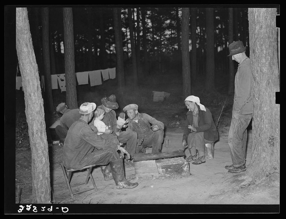 Migrant berry families by the campfire near Ponchatoula, Louisiana by Russell Lee