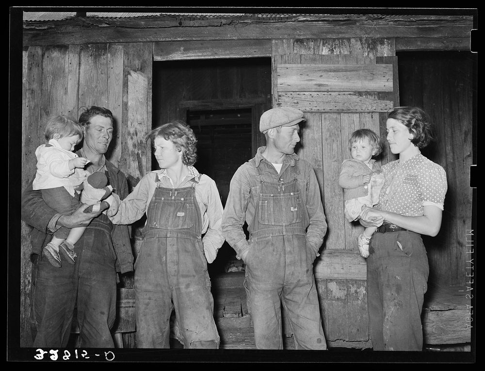Two young couples with their children. These are migratory berry pickers near Ponchatoula, Louisiana by Russell Lee