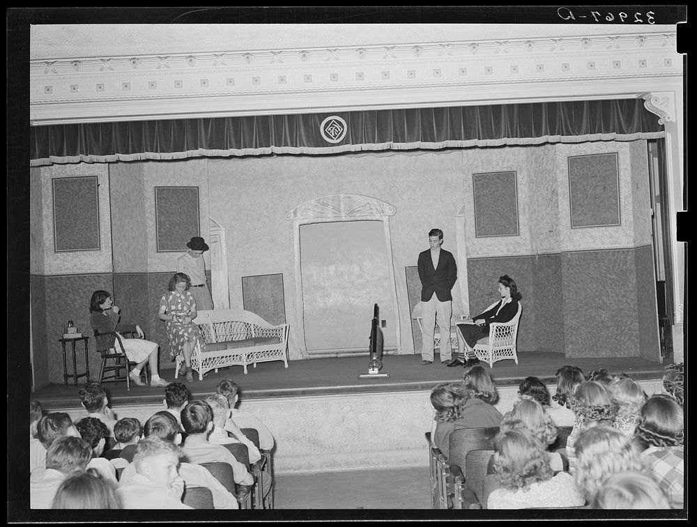 Schoolchildren watching senior class play. Free Photo rawpixel