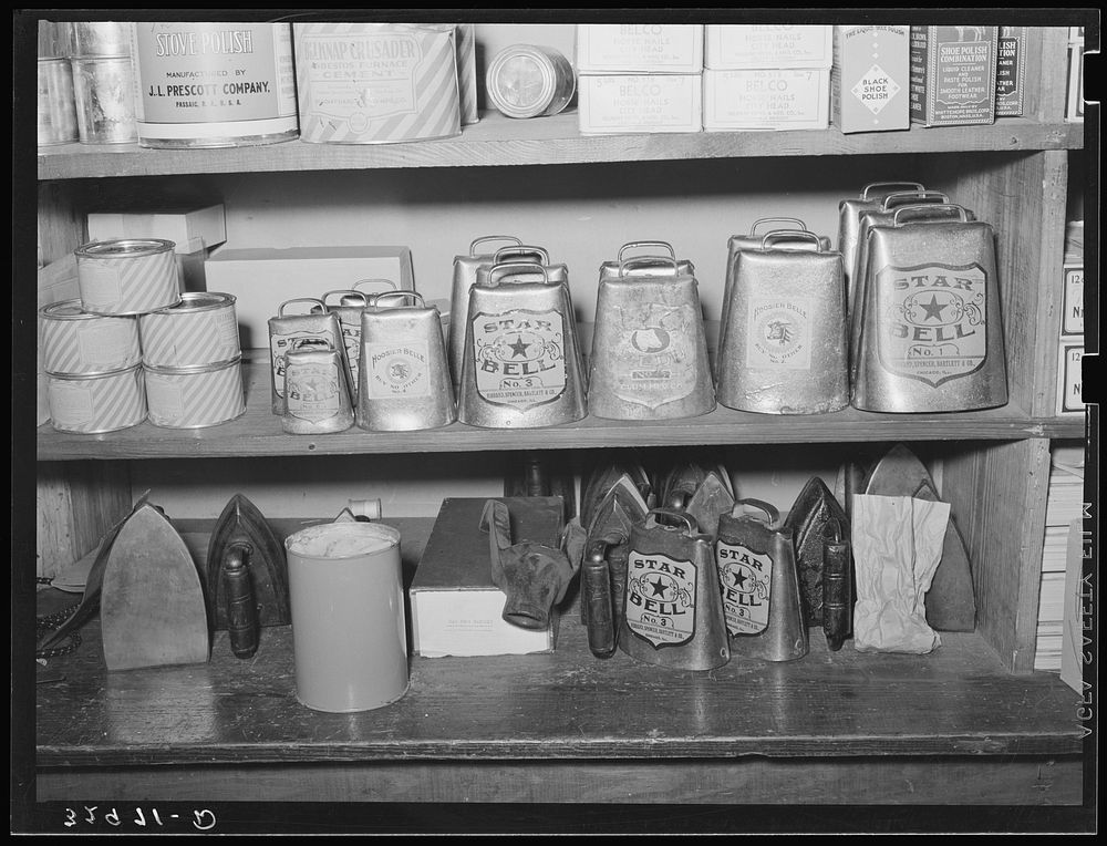 Cowbells, hardware store. San Augustine, Texas by Russell Lee