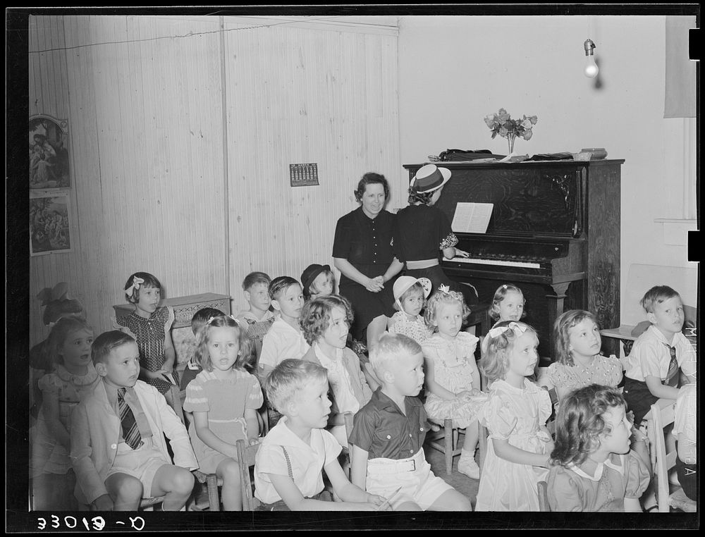 Primary Sunday schoolchildren singing. San Augustine, Texas by Russell Lee