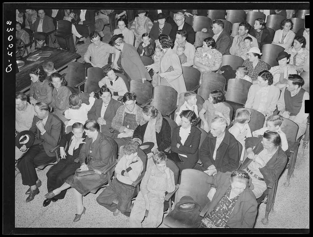 People waiting for Department of Agriculture movie. Courtroom, San Augustine, Texas by Russell Lee