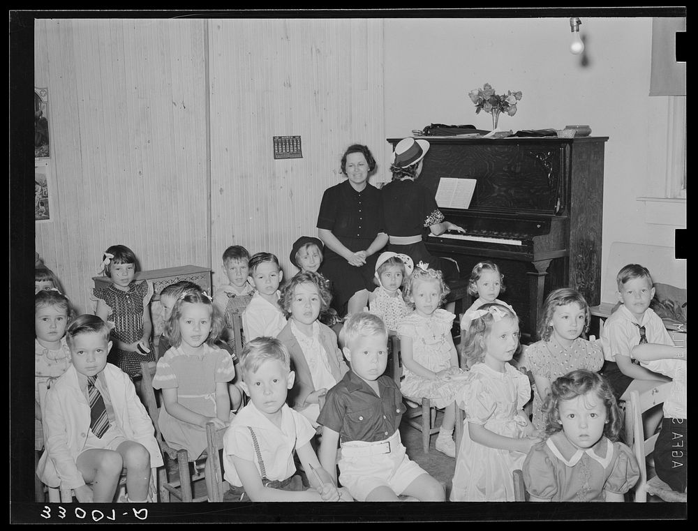 [Untitled photo, possibly related to: Primary Sunday schoolchildren singing. San Augustine, Texas] by Russell Lee