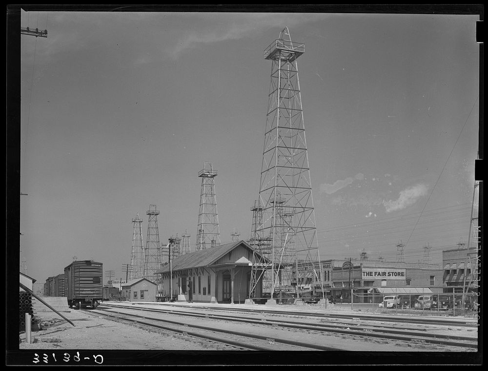 Railroad station and business section of Kilgore, Texas by Russell Lee