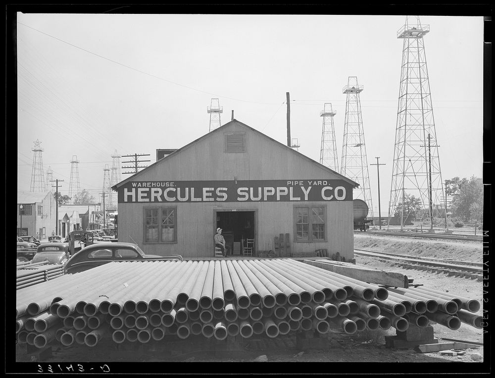 Pipe supply company. Oil field. Kilgore, Texas by Russell Lee