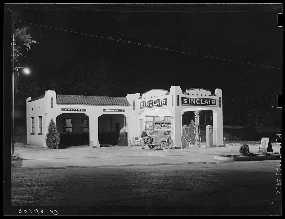 Oil and gasoline service station, San Augustine, Texas, at night by Russell Lee
