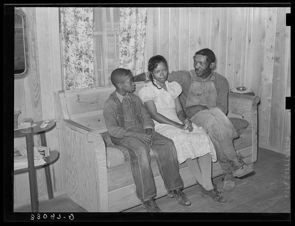 [Untitled photo, possibly related to: FSA (Farm Security Administration) family in living room of home. Sabine Farms…