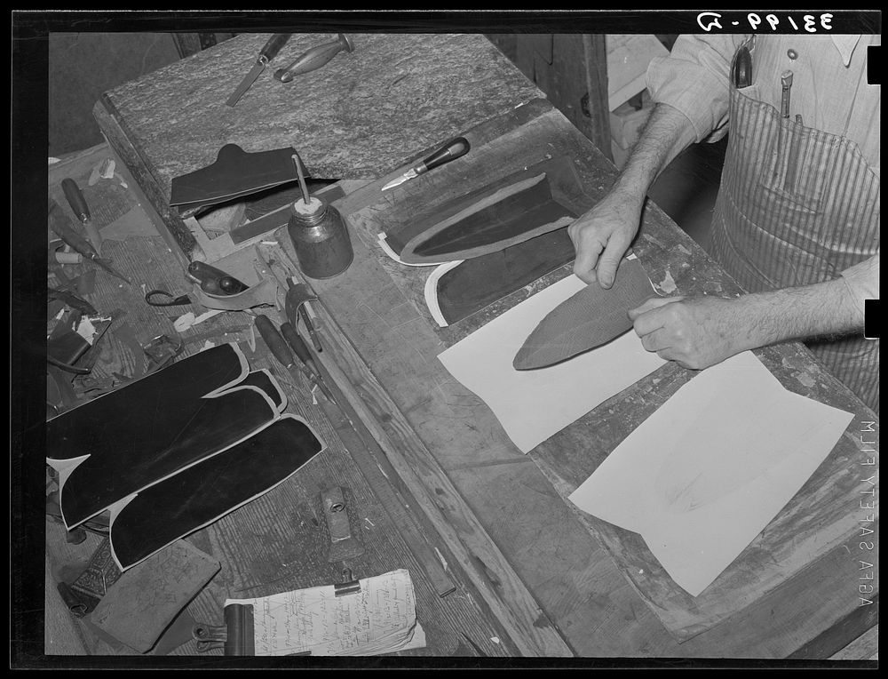 Gluing lining into upper part of boot. Bootmaking shop, Alpine, Texas by Russell Lee