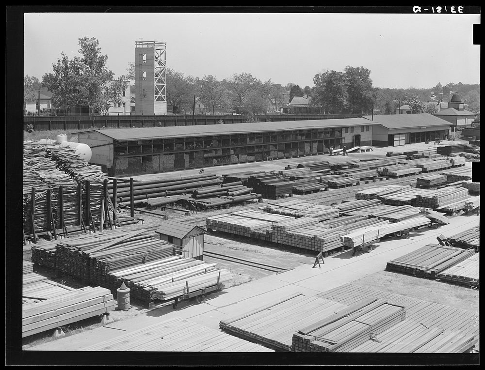 Railroad yards showing stored lumber. Marshall, Texas by Russell Lee