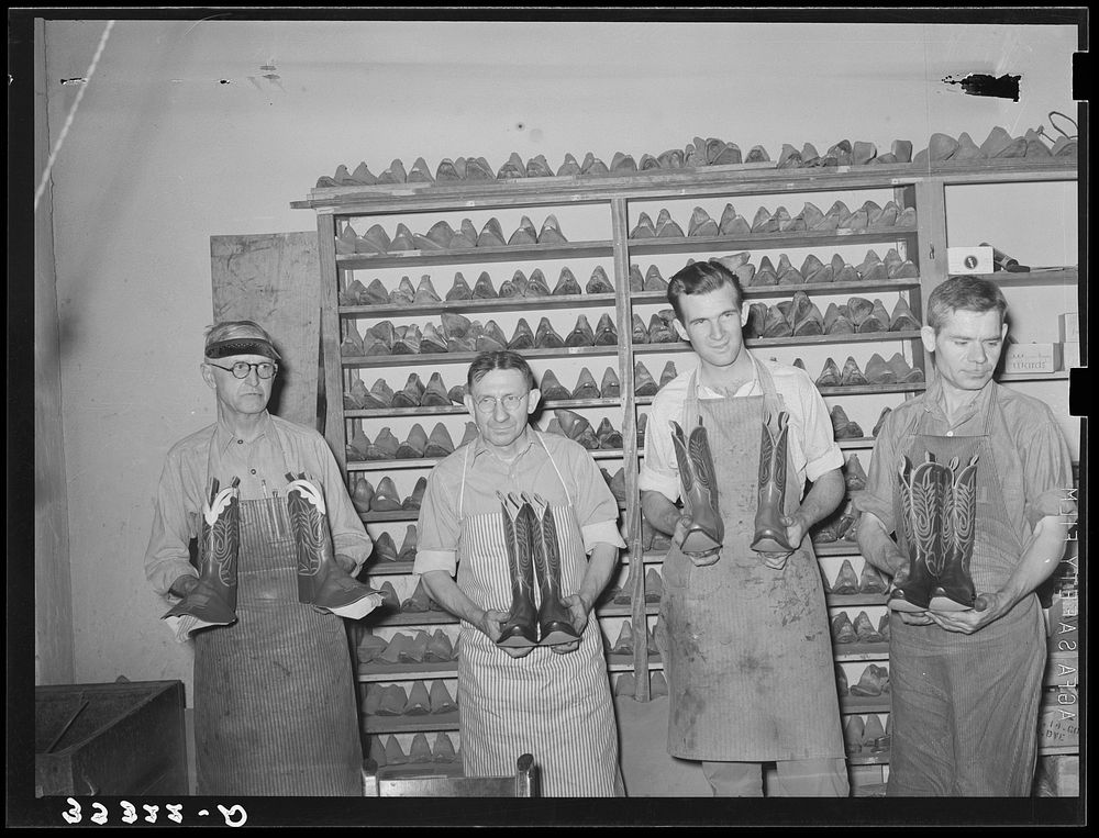 [Untitled photo, possibly related to: Workers in the bootmaking shop. Alpine, Texas] by Russell Lee