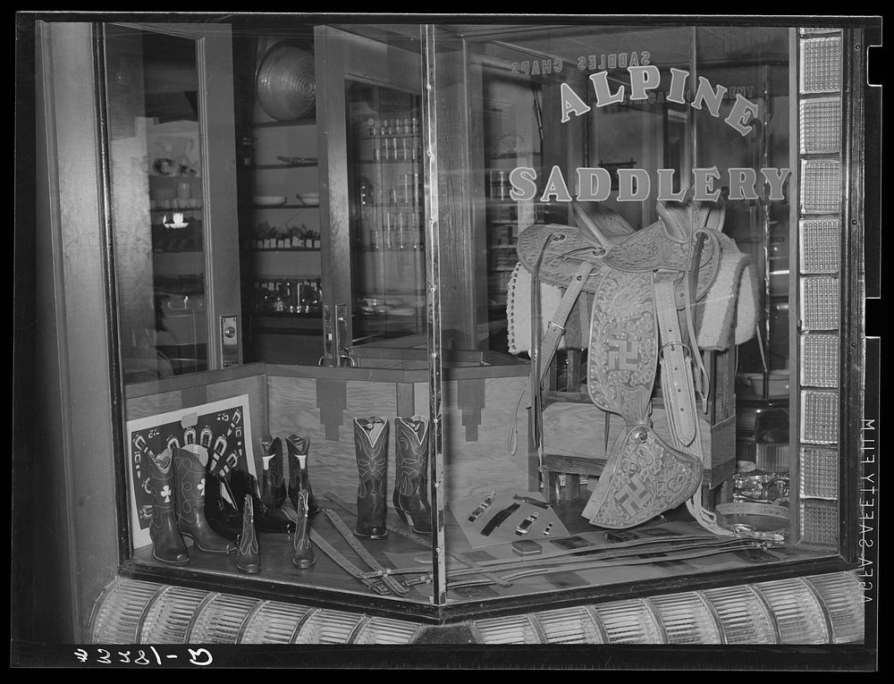 Window display at saddle and ranch supply store. Alpine, Texas by Russell Lee