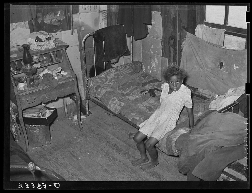 Interior of African American agricultural day laborer's home in Muskogee County, Oklahoma. These houses rent from two to…