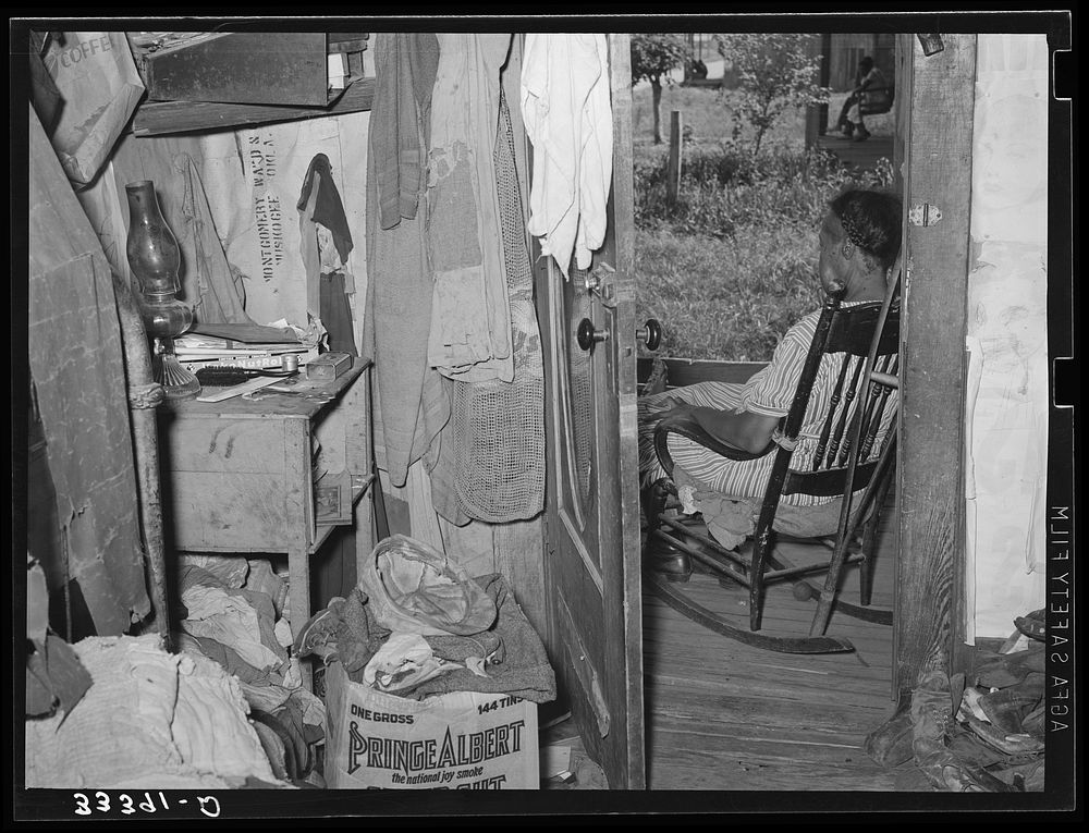 Corner of bedroom of African American agricultural day laborer's home. Muskogee County, Oklahoma by Russell Lee