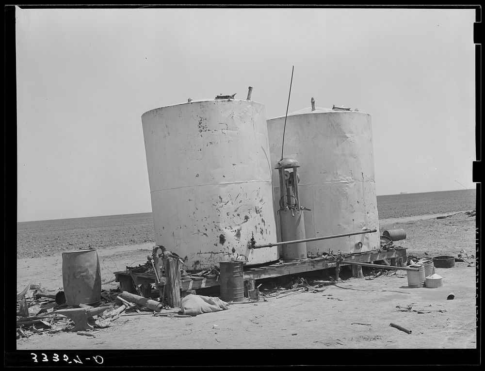 Gasoline storage tanks on 4900 acre farm near Ralls, Texas by Russell Lee